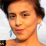 Load image into Gallery viewer, Closeup of woman wearing iridescent acrylic and resin hornet wing earings
