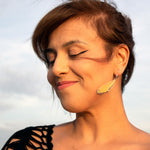 Load image into Gallery viewer, Woman wearing iridescent acrylic and resin hornet wing earrings
